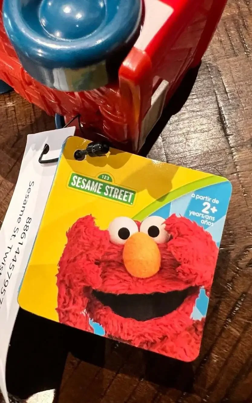 Sesame Street Twist & Pop Wheelies Elmo Fire Truck Vehicle Toy